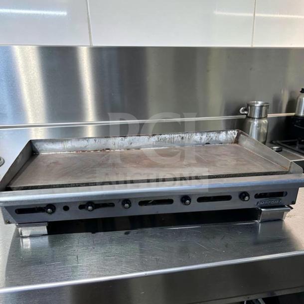 Superior condition Imperial ITG-60 commercial gas griddle, 60" with 1" steel plate, thermostatic controls, natural gas, fully tested.