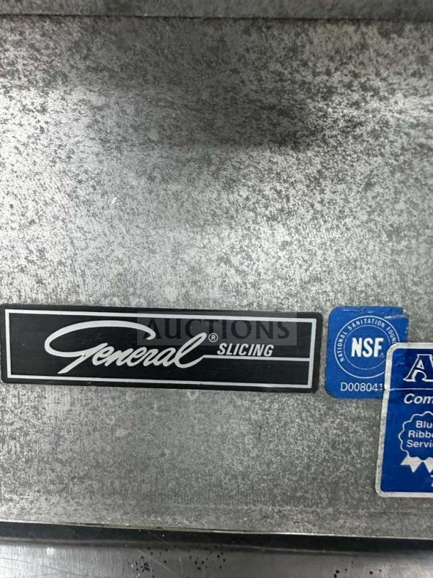 General Slicing CSM-72AA commercial food processor, NSF-certified, label on metal surface, in exceptional condition.