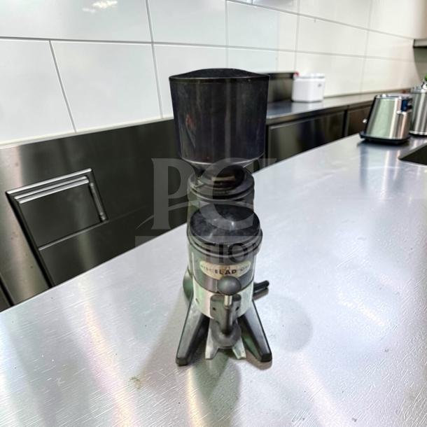 OBEL Mito ATR M64 commercial coffee grinder in exceptional condition on a metal countertop, fully tested and operational.