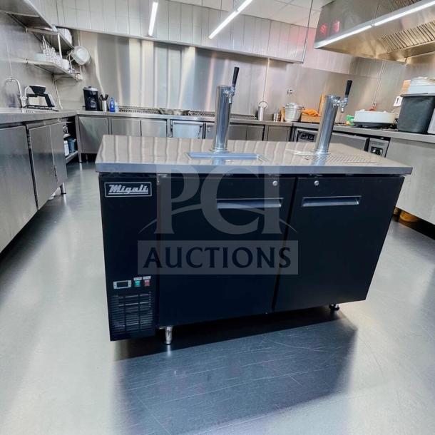 Migali C-DD60-2-HC 60" commercial kegerator, dual tap, 2 keg capacity, top-tier condition, 115V, in stainless steel kitchen.