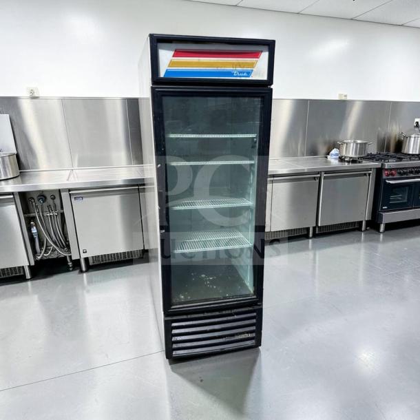 Outstanding True GDM-23-HC commercial glass door merchandiser, black, single section, LED lighting, tested, 27", 115V.