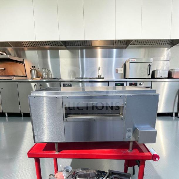 Exceptional condition Star Holman QT14 conveyor toaster oven on a red cart; stainless steel, 208/240V, fully tested.