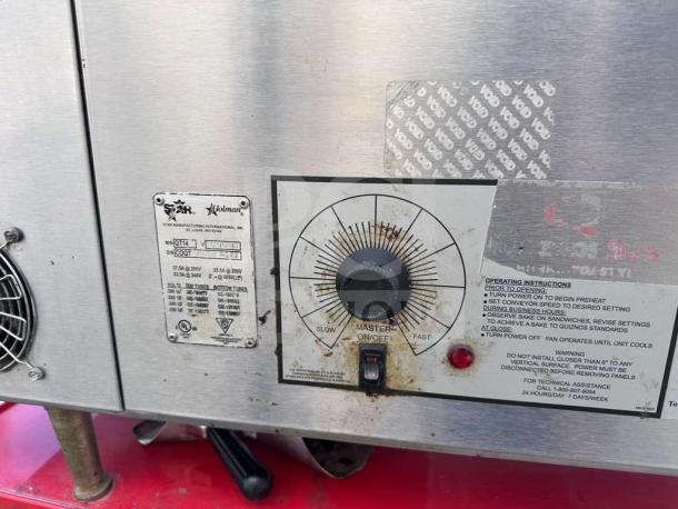 Star Holman QT14 commercial conveyor toaster oven, stainless steel; features control panel with temperature dial and operational instructions.