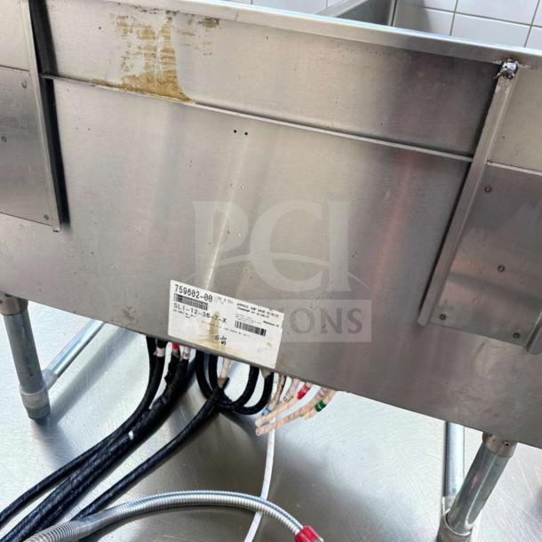 Advance Tabco SLI-12-36-7 stainless steel underbar ice bin with 7 circuit cold plate, fully operational, visible model label.