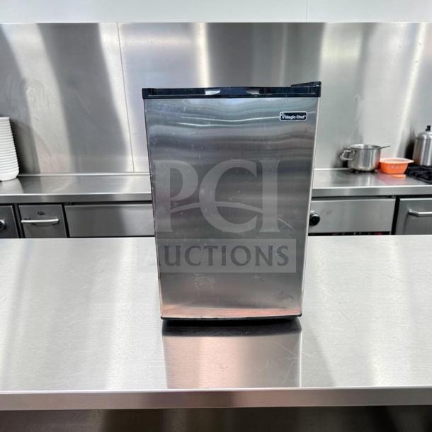 Magic Chef MCUF3S2 3 Cu. Ft. stainless steel compact upright refrigerator, excellent condition, space-saving, tested operational.