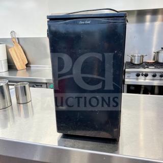 Euro-Gold W-995 compact undercounter refrigerator, black finish, Euro-Gold logo, space-saving mini fridge, fully operational.