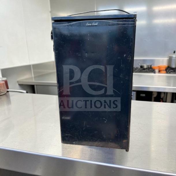 Euro-Gold W-995 mini fridge, black, undercounter model. Space-saving, fully tested, operational, 115V, visible branding.