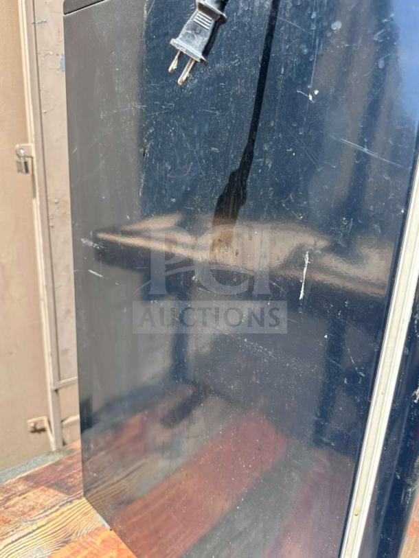 Euro-Gold W-995 compact undercounter refrigerator, black finish, model appropriately plugged, minor surface scuffs, fully operational.