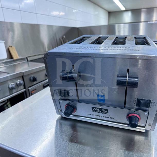 Waring WCT850 4-slice heavy duty toaster in elite condition, stainless steel, dual controls for bread and bagels, NSF certified.