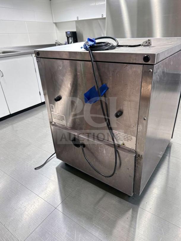 True TUC-27G-HC commercial undercounter glass door refrigerator, 27", stainless steel, excellent condition, fully tested.