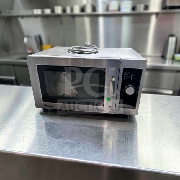 Amana RMS10DSA commercial microwave oven, 1000W, stainless steel, dial controls, excellent condition, model label visible.