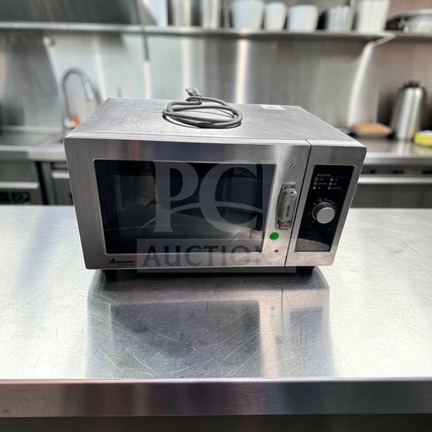 Amana RMS10DSA commercial microwave oven, 1000W, stainless steel, dial controls, in exceptional condition, 120V.