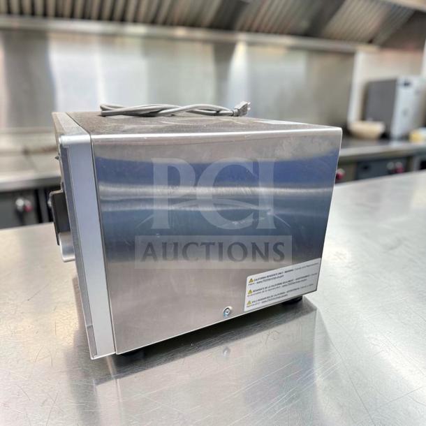 Amana RMS10DSA commercial microwave oven, 1000W, stainless steel, dial controls, excellent condition, heavy-duty, 120V.