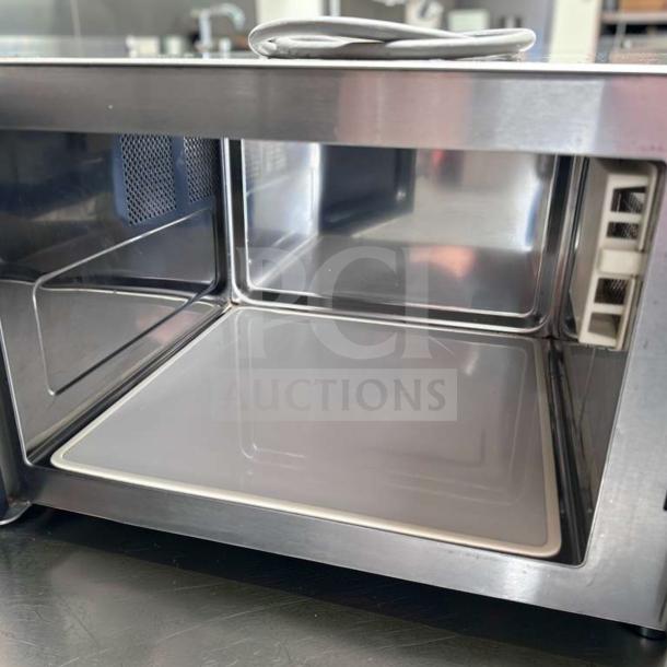 Amana RMS10DSA commercial microwave oven, 1000W, stainless steel, dial controls, exceptional condition, 120V, interior view.