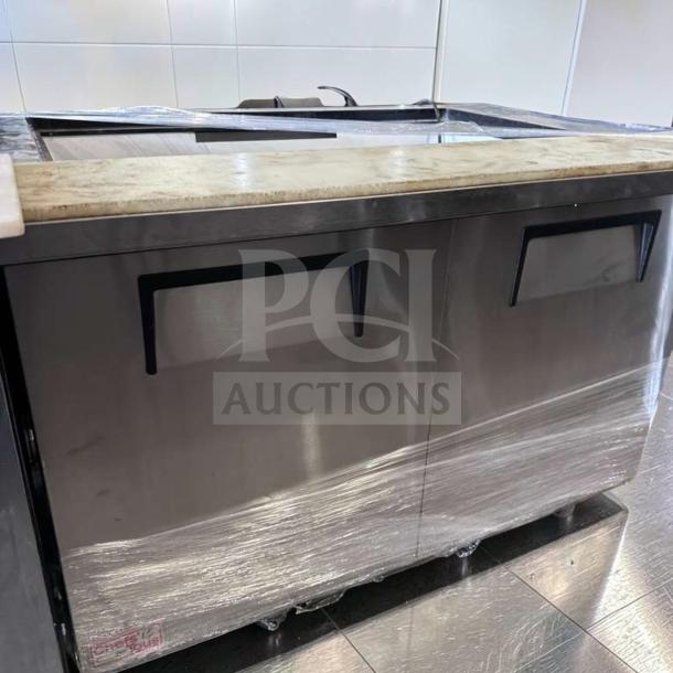Outstanding condition True TSSU-48-18M-B-HC 48” mega top sandwich/salad prep table with refrigerated base, fully operational.