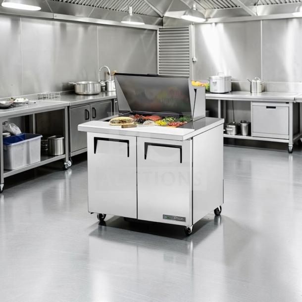 True TSSU-36-12M-B-HC commercial sandwich prep table, 36-inch, excellent condition, fully tested, 115V, model tag visible.