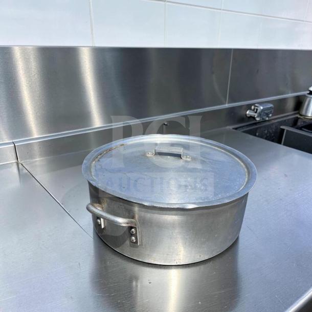 Heavy-duty aluminum stock pot with lid, large capacity, excellent condition, fully inspected, Generic Commercial.