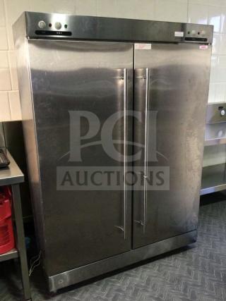 Superior condition, XDR640-F1A stainless steel sterilizer cabinet, fully tested, Commercial Equipment brand, double-door design.