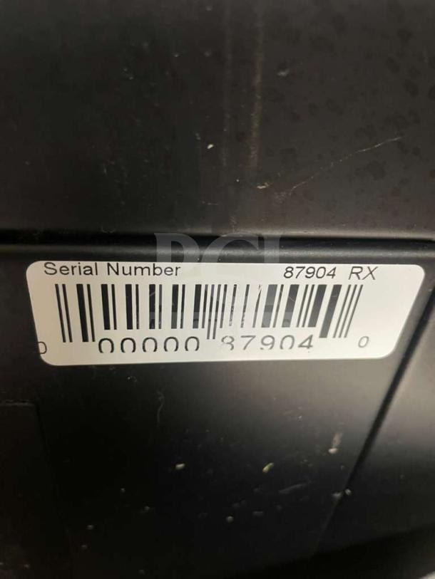 Serial number label on Commercial Cold Brew Coffee Dispenser, shows "87904 RX" and barcode, confirming model CBR-L-DSP-0056.