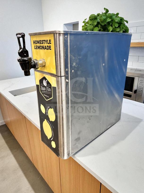 Newco FPM-1 lemonade dispenser, stainless steel, NSF listed, countertop model, homestyle lemonade graphic, fully tested.