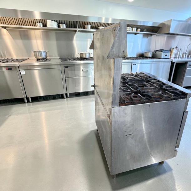 Imperial IR-6 36" commercial gas range with 6 burners and oven in exceptional condition, fully tested and operational.