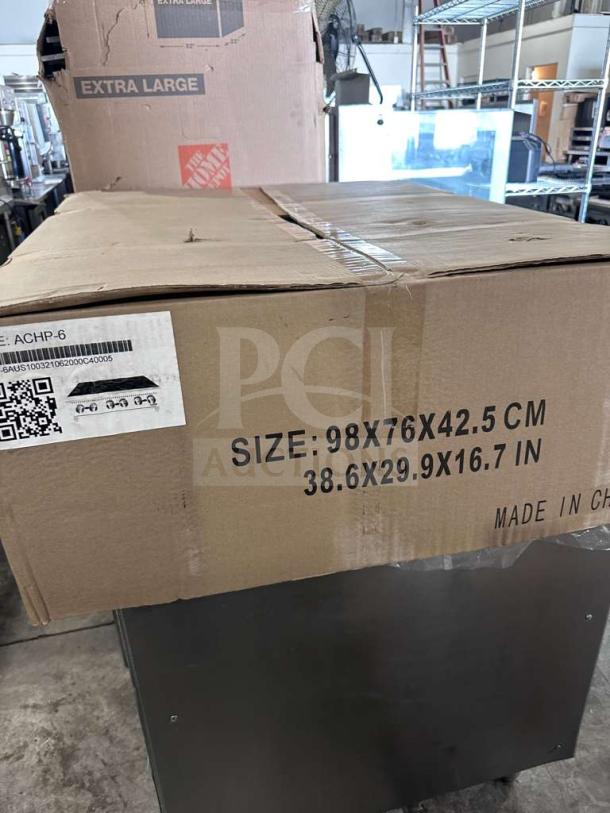 Boxed Atosa USA ACHP-6 gas hot plate, 6 burners, new condition. Dimensions: 38.6x29.9x16.7 in. Model: ATO-L-HP-0696.