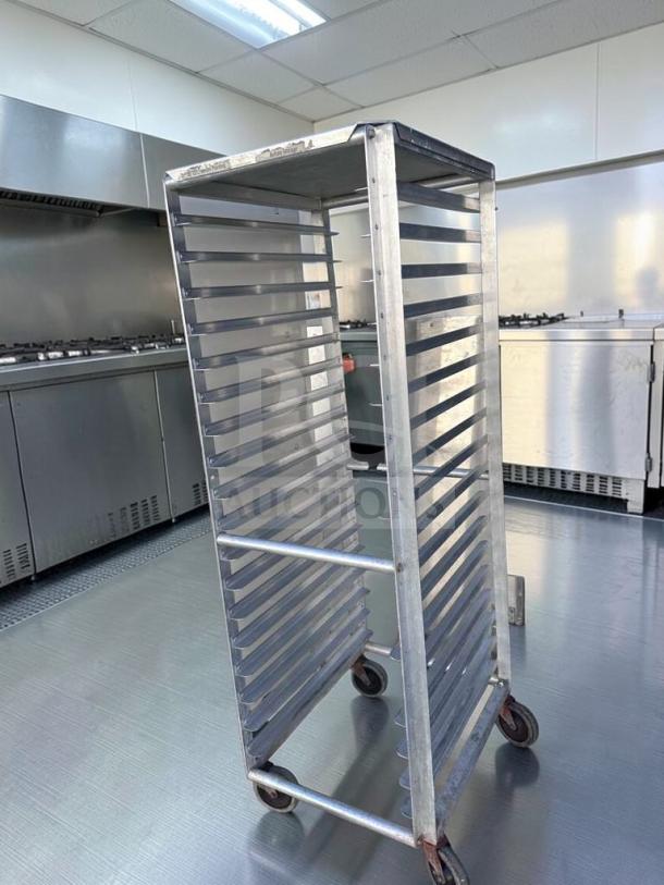 Commercial aluminum full-size sheet pan rack with 20 pan capacity. Heavy-duty, premium condition with casters. Model ALU-M-RCK-0575.
