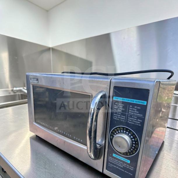 Sharp R-21LCFS Commercial Microwave Oven, 1000W, stainless steel, dial control, top-tier condition, fully tested and operational.