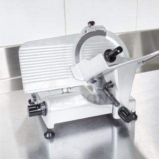 Globe G12 12" commercial manual meat slicer, 1/2 HP, heavy-duty gravity feed, elite condition, fully tested operational.