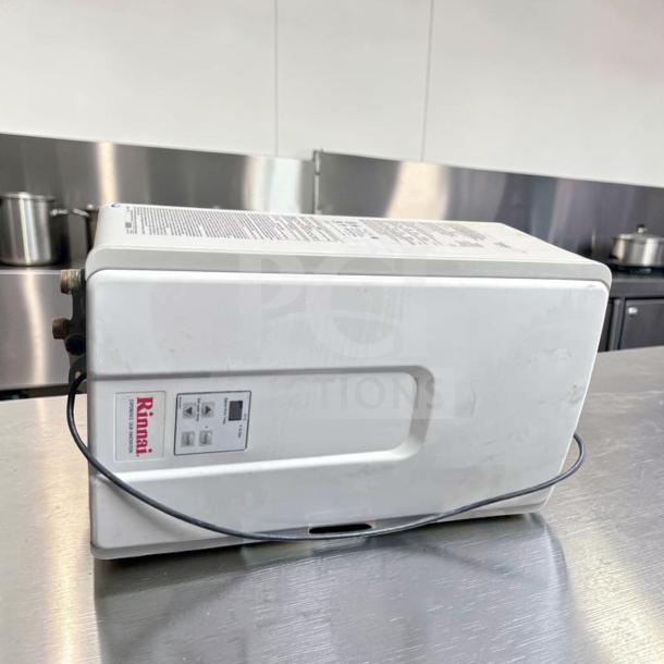 Rinnai V75iN tankless water heater, natural gas, 7.5 GPM, 180,000 BTU, indoor use, high efficiency, excellent condition.