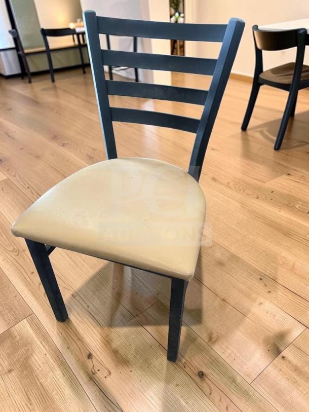 Black metal ladder back dining chair with padded vinyl seat, generic commercial, inspected and ready for use. Quantity: 5.