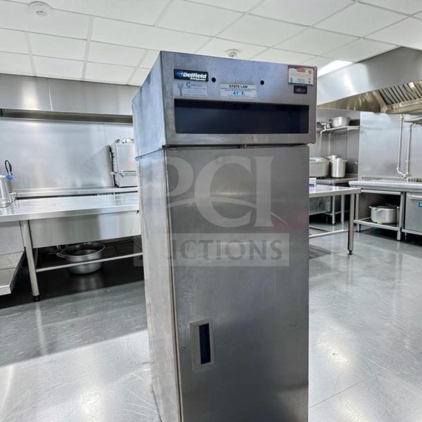 Delfield 6025XL-S reach-in refrigerator, stainless steel, single section, excellent condition, 115V, tested, model number tag visible.