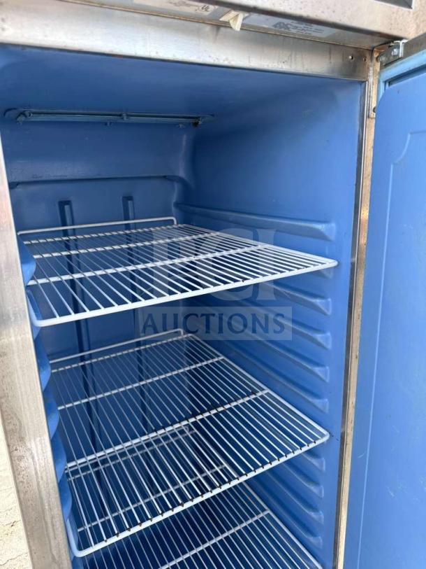 Delfield 6025XL-S reach-in refrigerator, stainless steel, prime condition, 25 1/2", commercial, shelves visible.