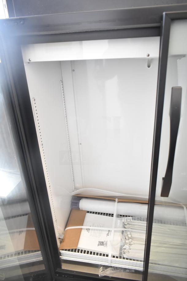 Brand new 2026 True TVM-36SL-HC commercial 2-door reach-in cooler, with scratch and dent. Includes manuals and accessories.