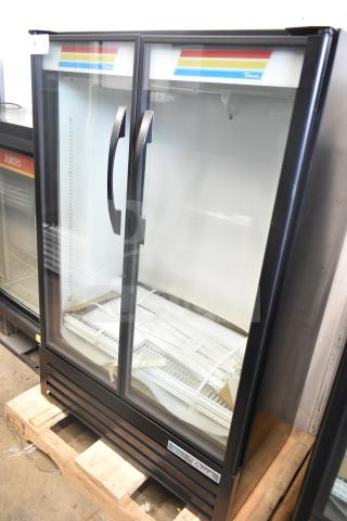 Brand new 2026 True TVM-36SL-HC cooler merchandiser, two glass doors, minor dents, 115 volts, 1 phase.