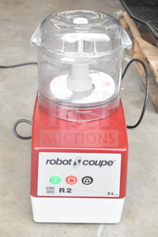 BRAND NEW Robot Coupe R2BCLR food processor, 3 Qt. clear batch bowl, 1 hp, 120V, 1 phase, red/silver finish, minor scratches.
