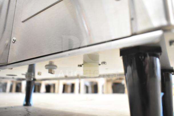 Bunn DUAL TF DBC BrewWISE machine underside view, brand new with minor dents. Features funnel lock and hot water dispenser.