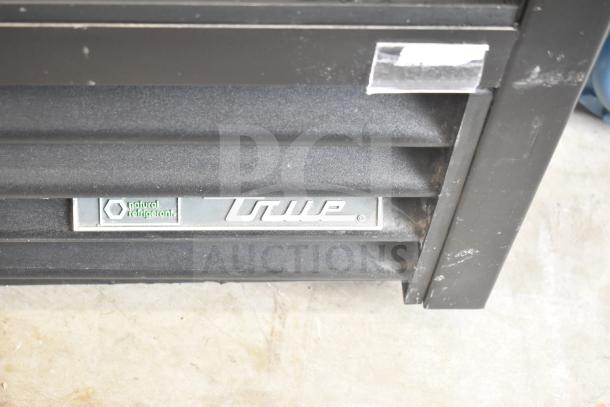 True GDM-41SL-54-HC-LD cooler base showing brand logo and "natural refrigerant" tag, black finish.