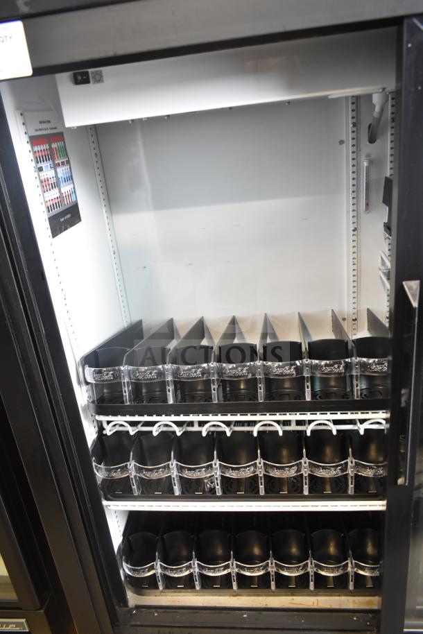 True GDM-41SL-54-HC-LD 2 Door Cooler Merchandiser, shelves organized, 115V, clean interior, commercial use.