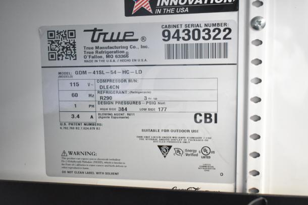 Label of True GDM-41SL-54-HC-LD cooler. Shows specs: 115V, 1PH, R290 refrigerant, DLE4CN compressor. Serial 9430322.