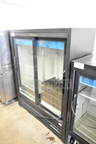 True GDM-41SL-60-LD commercial cooler, 2 glass doors, black frame, Red Bull branding, 115V, 1 phase, used condition.