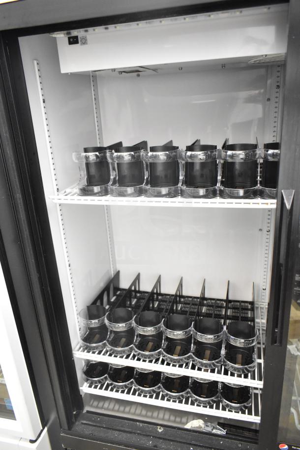 True GDM-41SL-54-HC-LD cooler merchandiser, 2-door, shelves inside, clean condition, for commercial use, 115V, 1 phase.