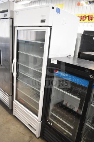 2020 True TSCI-600R-G-PH commercial cooler. Single glass door, 5 shelves, 115V, 1 phase. Good condition.