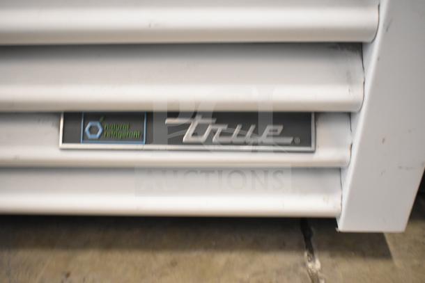 2020 True TSCI-600R-G-PH commercial cooler, single door, 115V, True logo, natural refrigerant label, used condition.