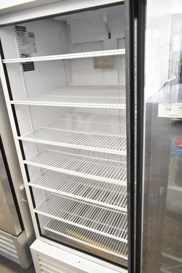 2020 True TSCI-600R-G-PH single door commercial cooler, 115 volts, 1 phase. Features glass door, adjustable shelves.