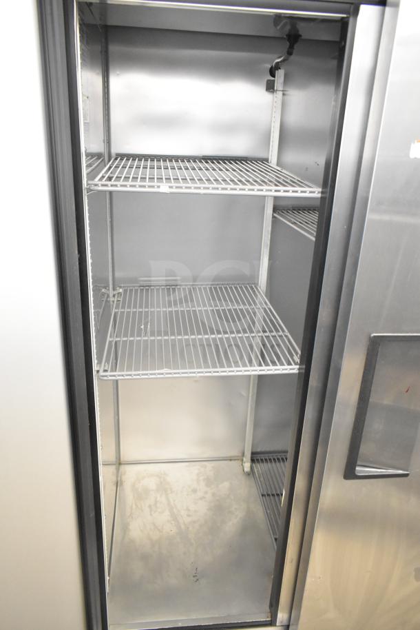 2020 True T-35-HC 2 Door Reach In Cooler, 115V, 1 Phase. Clean, stainless steel interior with wire shelves.