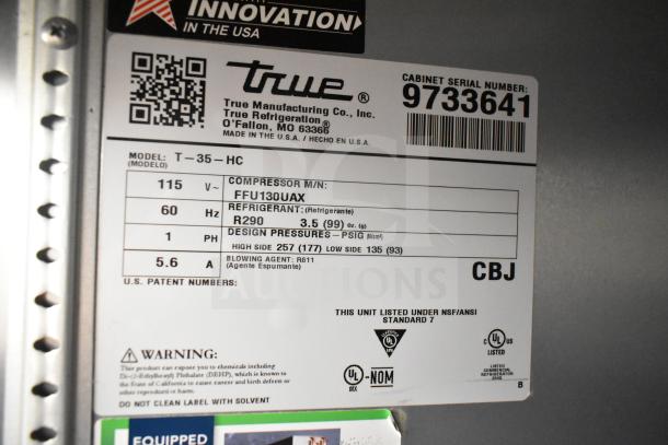 Label of 2020 True T-35-HC Commercial 2 Door Reach In Cooler displaying model, voltage, and refrigerant details.