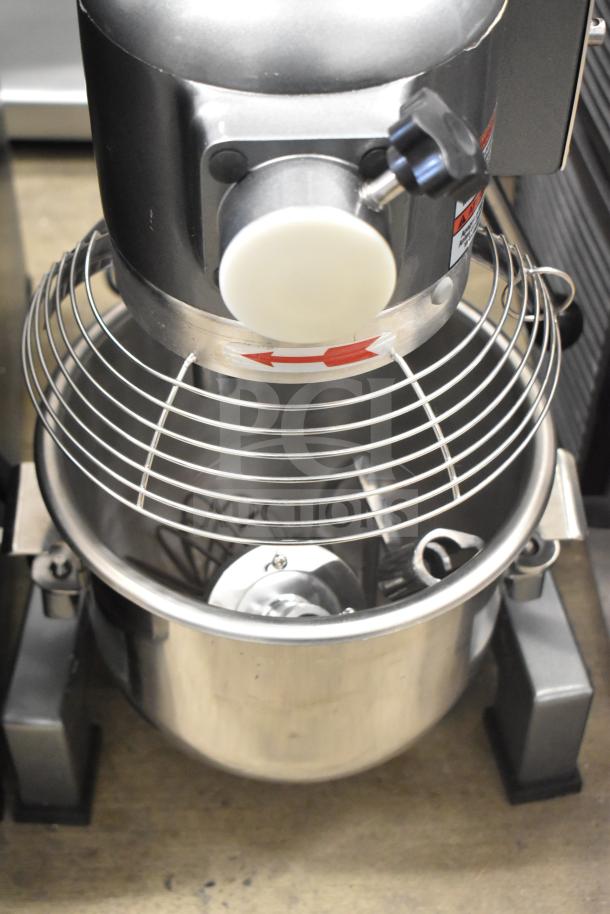 Alt text: Brand new Avantco 177MX10H 10-quart dough mixer with stainless steel bowl, bowl guard, paddle, and whisk attachments.