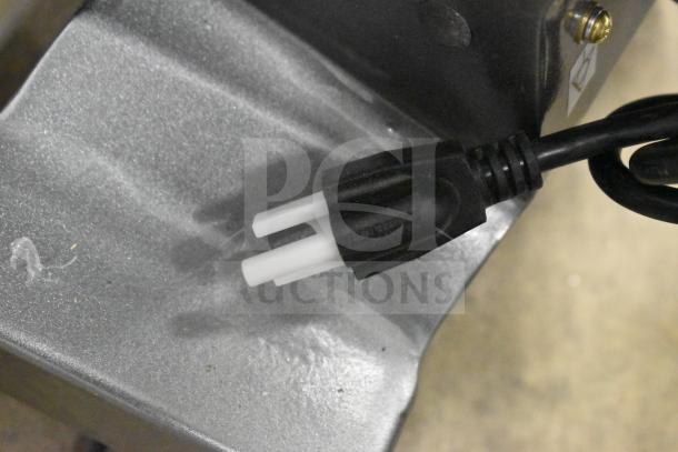 Power cord of the Avantco 177MX10H dough mixer, shown on a countertop surface.