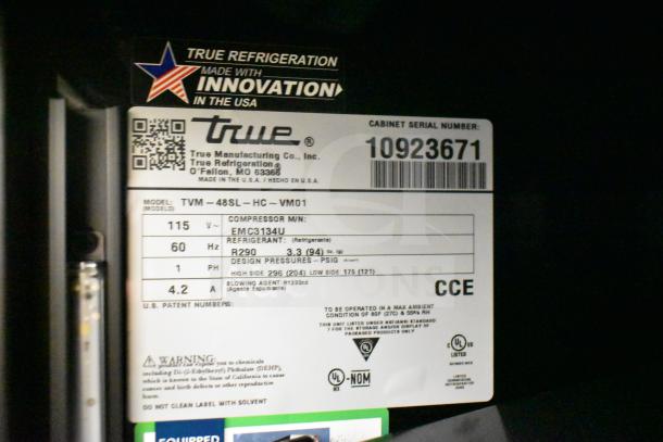 2025 True TVM-48SL-HC Commercial Cooler label, showing model, serial number, refrigerant, and specifications.